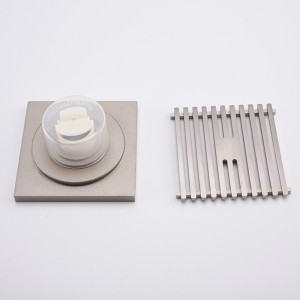 Оформете месинговите капаци за отводняване на пода в гаража