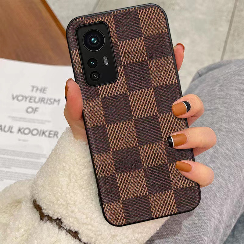 Подходящ е за луксозен калъф за мобилен телефон Xiaomi12Pro. Той е напълно обвит с голяма имитация на марка на ръка на ръка. Това е защитен кожен калъф за устойчивост на падане и драскотина